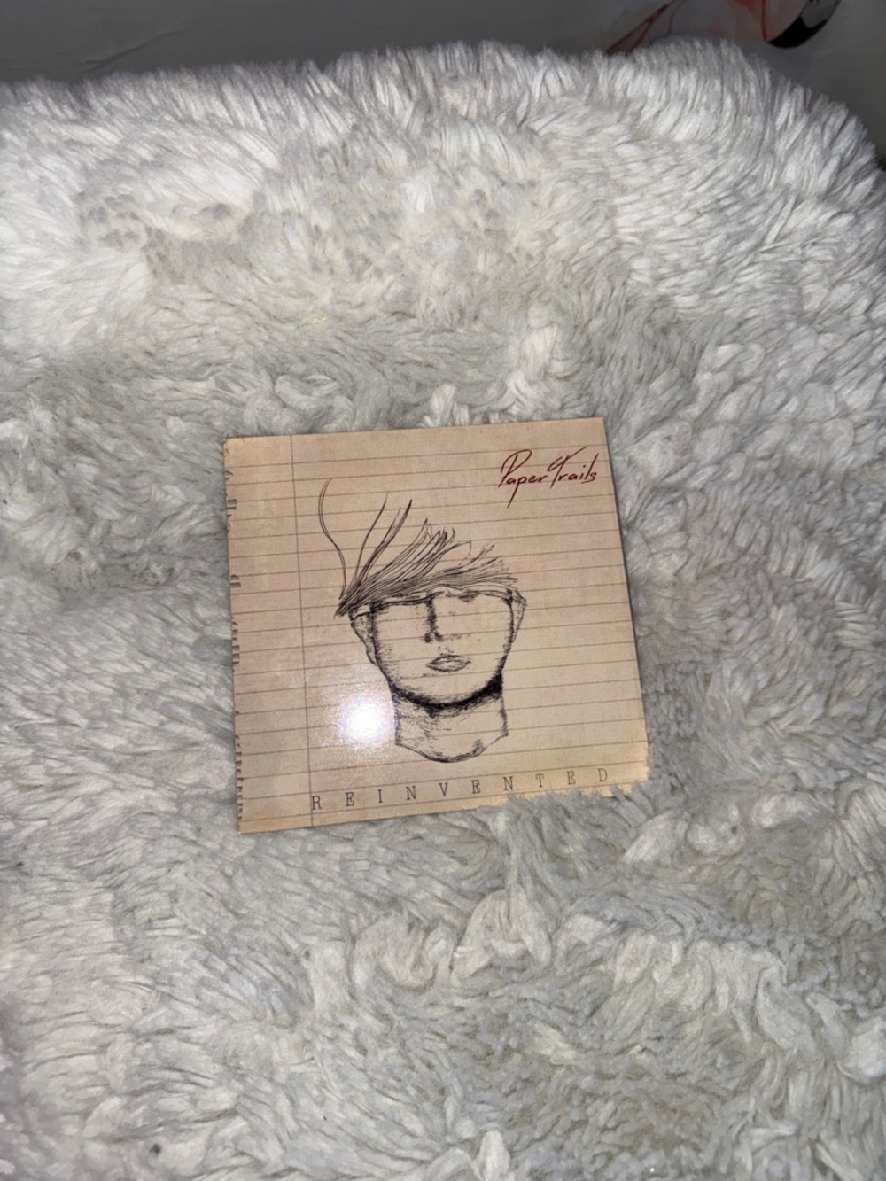 Paper Trails 'Reinvented' Beige Art Cover